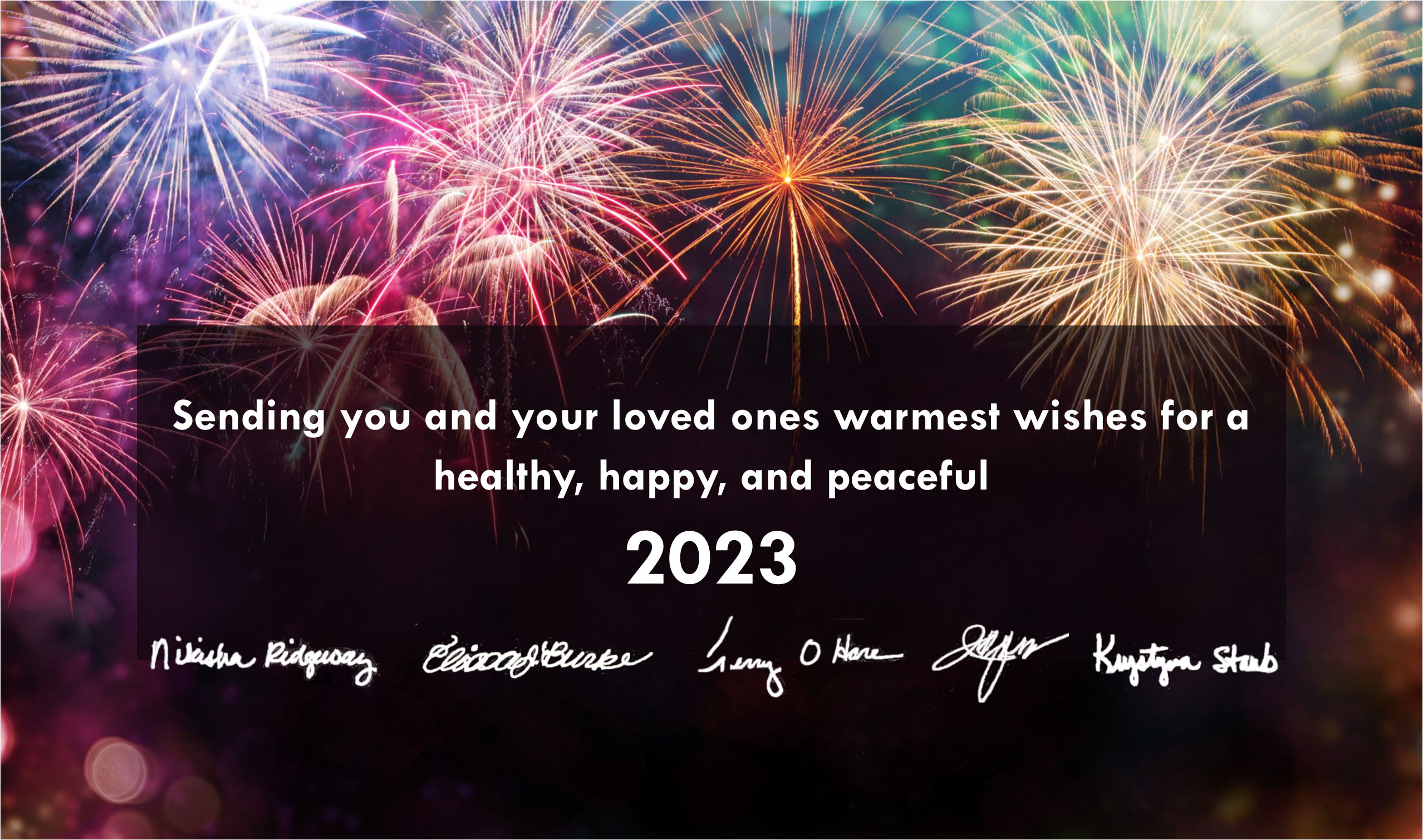 Image of colorful fireworks at night overlaid by message of warmest wishes for a happy healthy and peaceful 2023